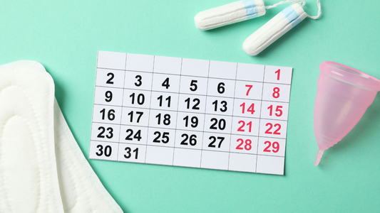 Calendar With Menstrual Care Products Nearby