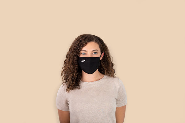 Model wearing Saalt face mask.