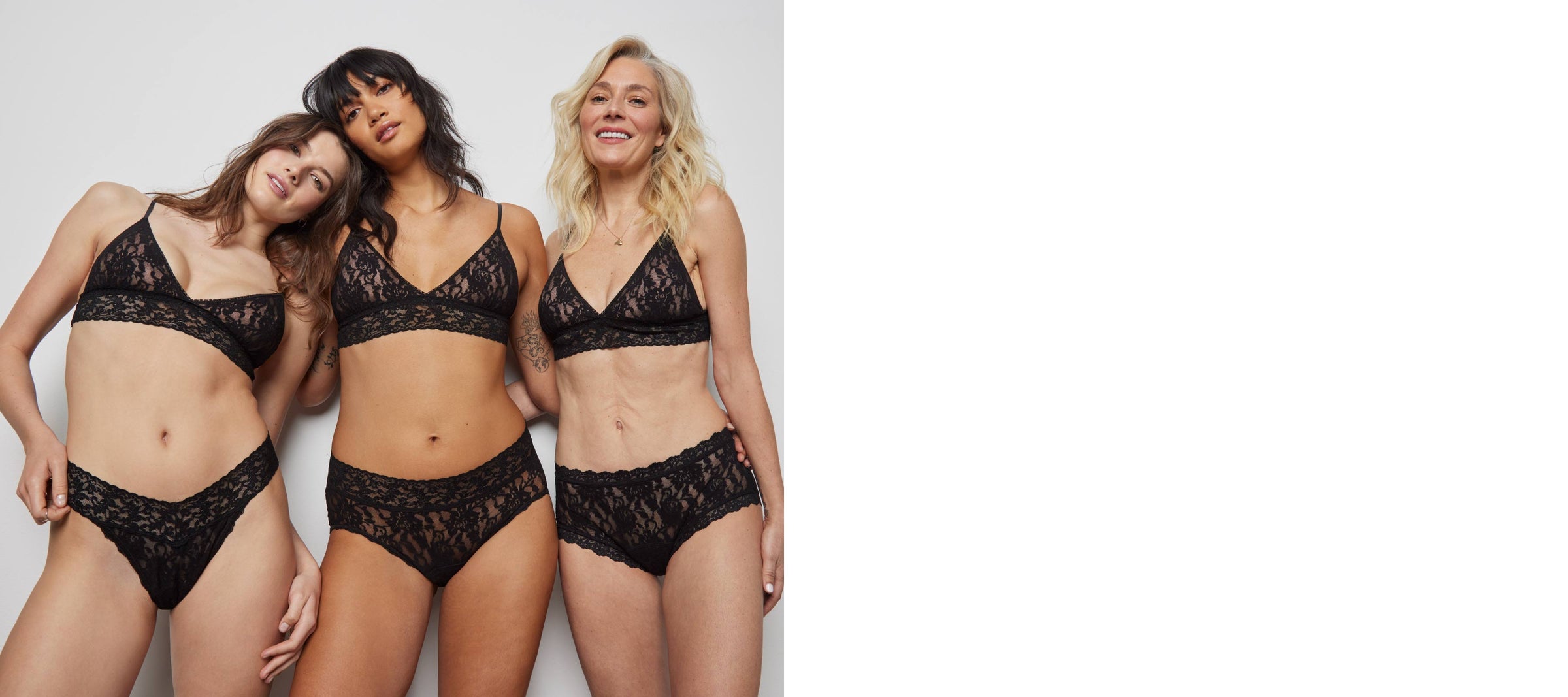 Three models wearing bras and underwear from Hanky Panky, featuring Hanky Panky+ powered by Saalt new leakproof underwear. Styles featured include the Original Rise Thong, Boyshort, and French Brief.