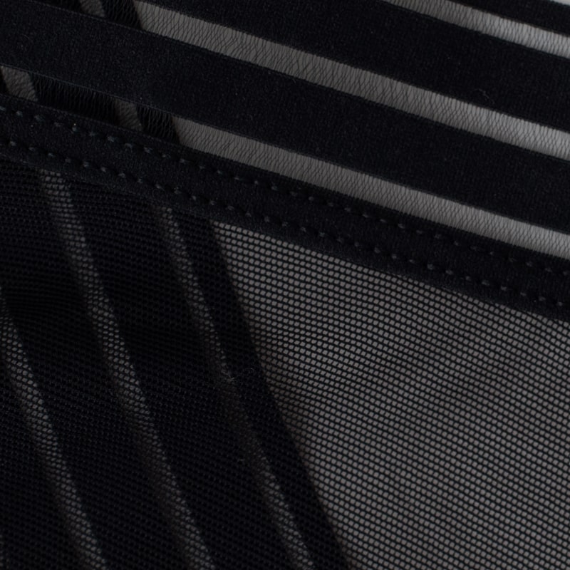 Closeup showing Saalt's Mesh fabric in color Volcanic Black.