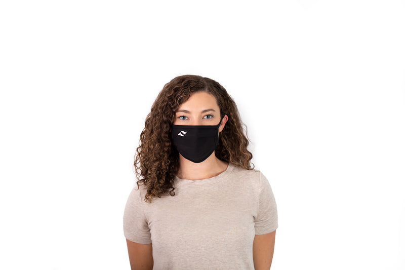  Model wearing mask with wire top frame, and adjustable ear straps.